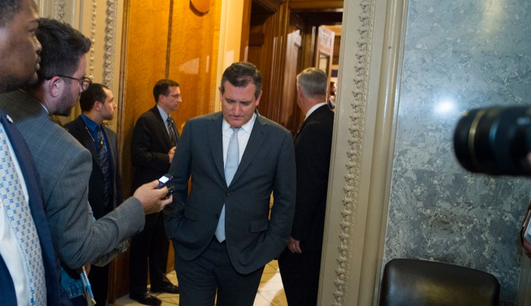 Sen. Ted Cruz, R-Texas, leaves the Senate Chamber after the Senate failed to pass a measure to repeal parts of former President Barack Obama's healthcare law, on Capitol Hill on Friday. (AP Photo/Cliff Owen)
