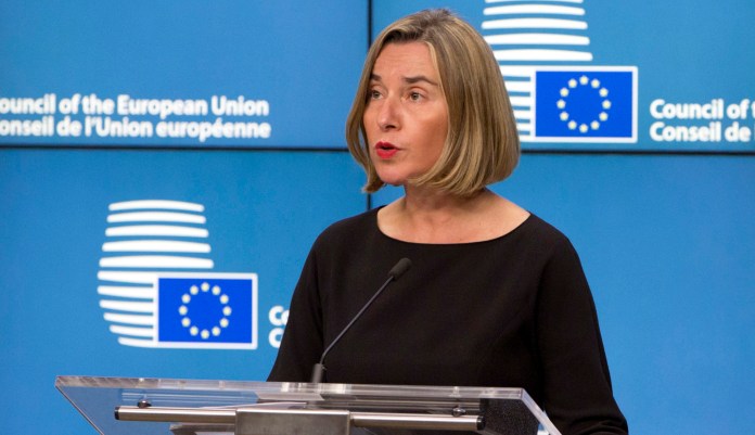 "The European Union support[s] the resumption of a meaningful peace process towards a two-state solution," Federica Mogherini said. "We will discuss this further with Prime Minister Netanyahu next Monday here in Brussels and with President Abbas later, at the beginning of next year, as we will host both of them separately at our next foreign affairs councils." (AP Photo/Virginia Mayo)