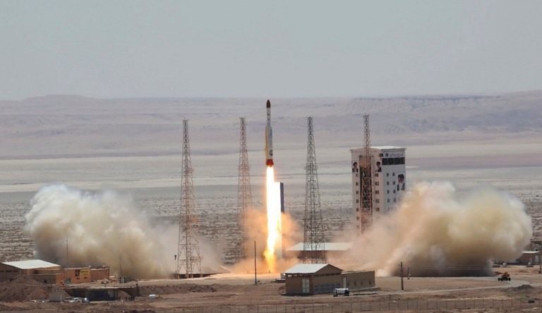 This picture released by the official website of the Iranian Defense Ministry on Thursday, July 27, 2017, claims to show the launching of Simorgh satellite-carrying rocket in an undisclosed location, Iran. (Iranian Defense Ministry via AP)