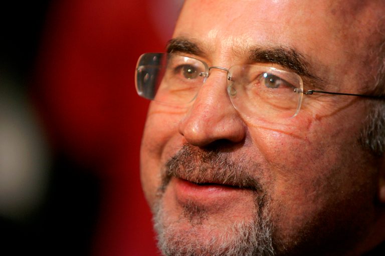 FILE - A Monday Oct. 30 2006 photo from files showing ast member British actor Bob Hoskins giving a television interview as he arrives at a gala screening for the film 'Hollywoodland' as part of the London Film Festival at a West End cinema in Leicester Square, London. Bob Hoskins, whose varied career ranged from 