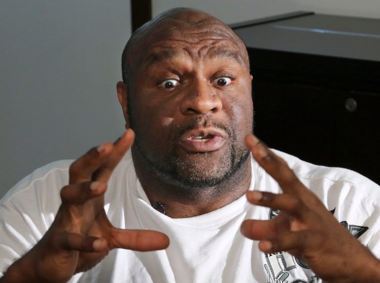 In this Friday, Aug. 15, 2014 photo, former NFL player Bob 