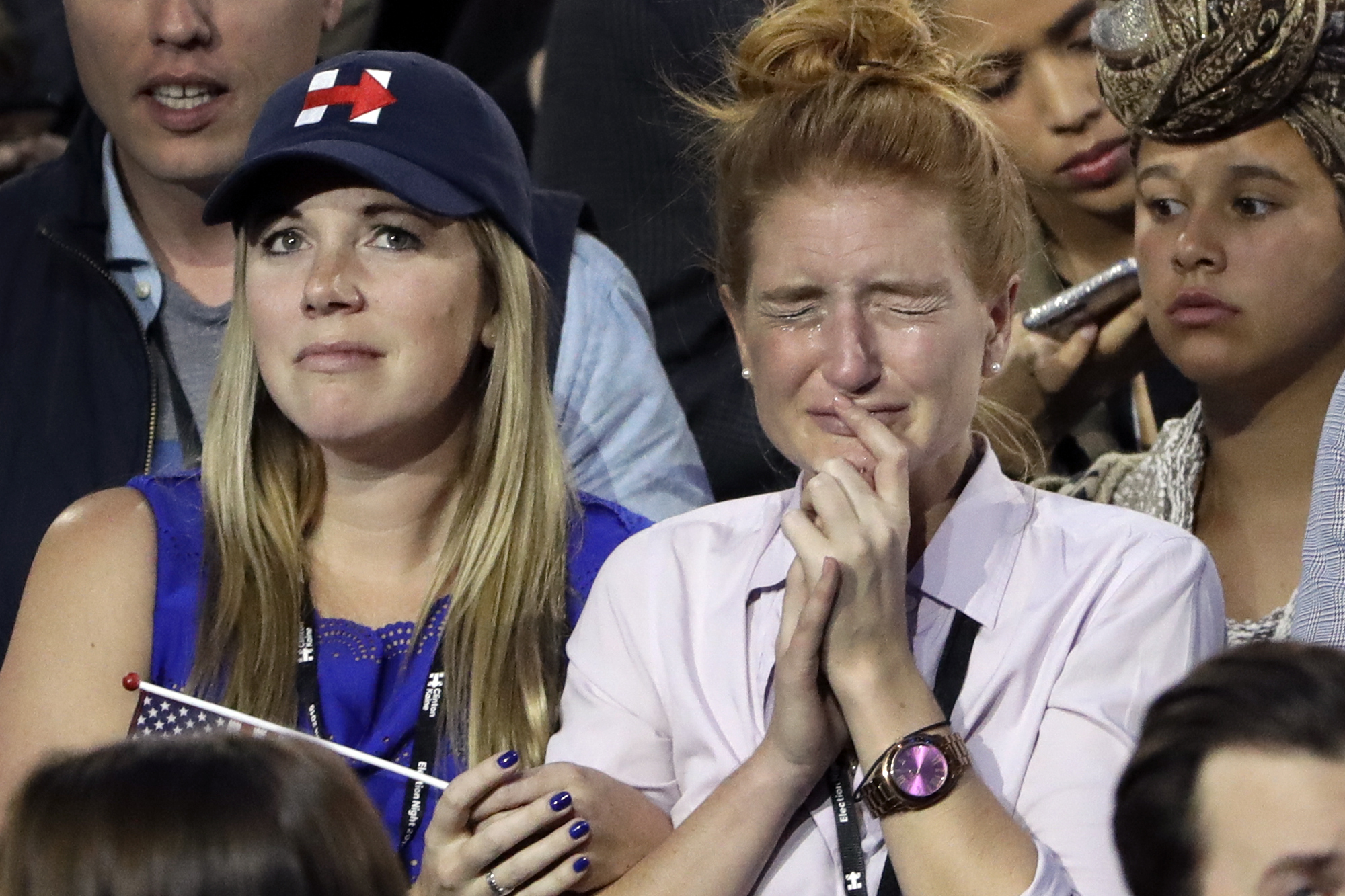 In defeat, Clinton supporters despair, float conspiracies