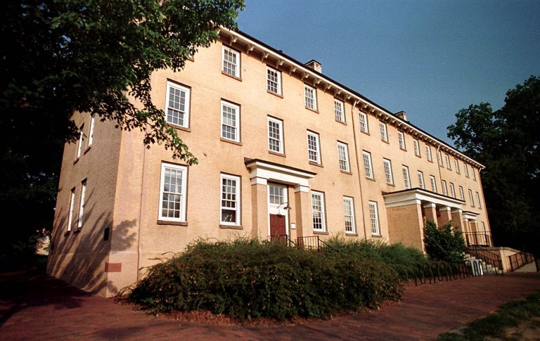Early-morning light bathes Old East dormitory on the campus of The University of North Carolina in Chapel Hill, N.C. (AP/Grant Halverson)