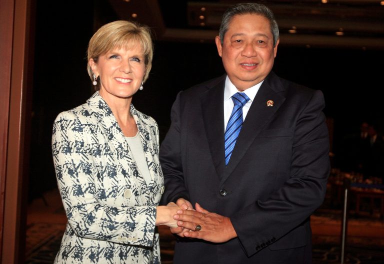 Indonesia's President Susilo Bambang Yudhoyono, right, greets Australia's Foreign Minister Julie Bishop during a meeting in Bali, Indonesia, Thursday, Aug. 28, 2014.  Australia and Indonesia have reached a new agreement on how they'll use their intelligence operations in the future, even settling their disagreement on its name. The agreement their foreign ministers are scheduled to sign Thursday on the Indonesian resort island of Bali is designed to mend a rift sparked last November by accusations that Australians tapped the cellphones of the Indonesian president, his wife and eight ministers and officials in 2009. (AP Photo/Firdia Lisnawati)