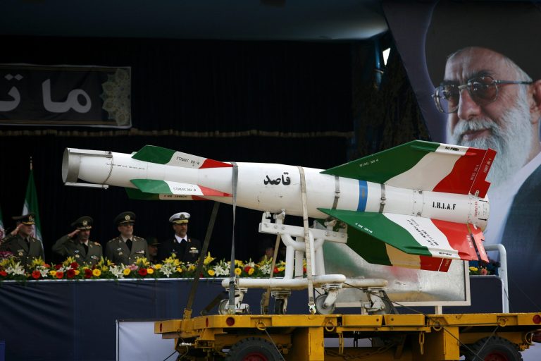 An Iranian surface to surface Ghasedak missile is driven past portraits of Iran's late founder of the Islamic Republic, Ayatollah Ali Khamenei, during the annual army day military parade on April 17, 2008 in Tehran, Iran. (Photo by Majid/Getty Images)