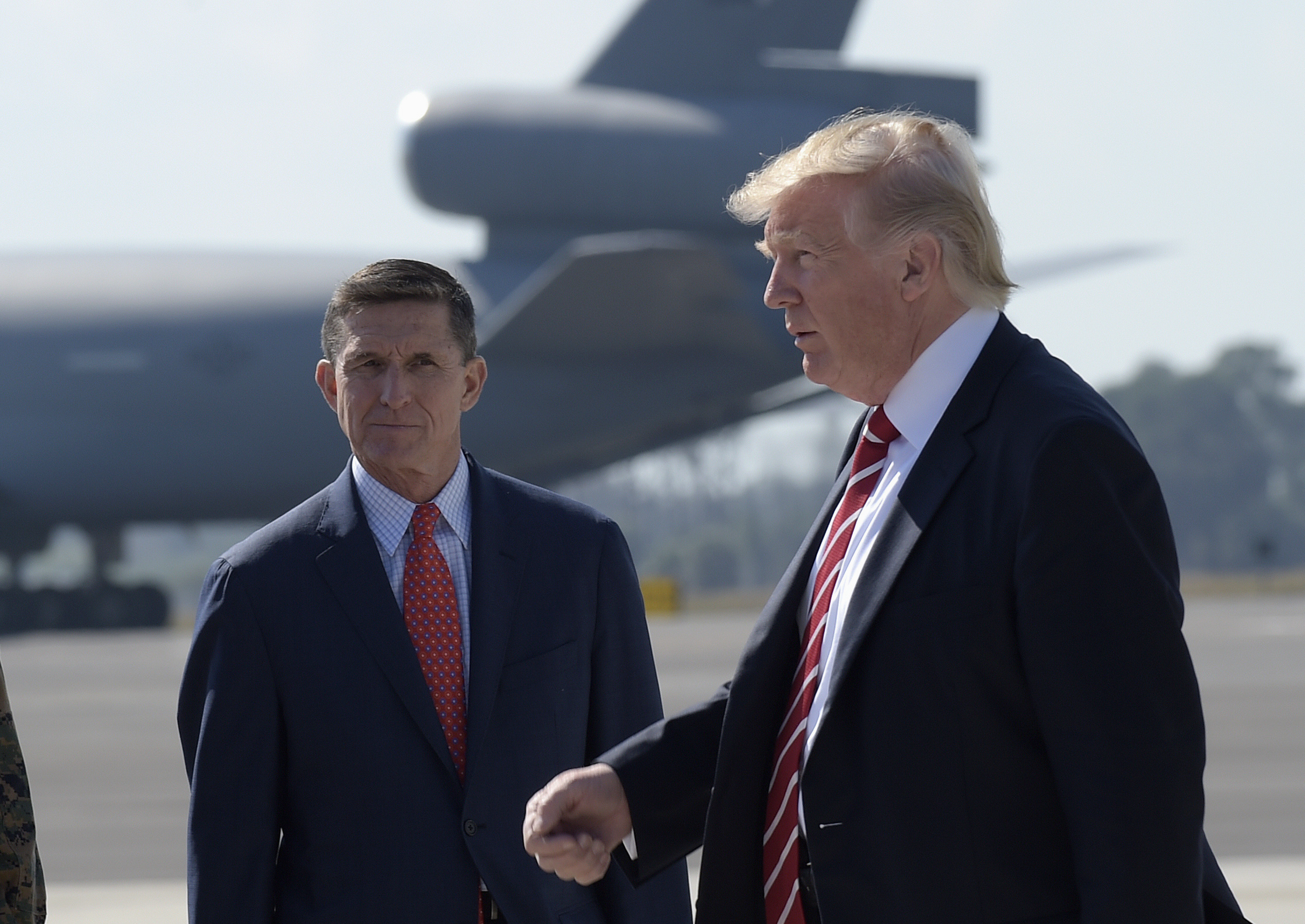 Trump ‘evaluating the situation’ regarding national security adviser Mike Flynn