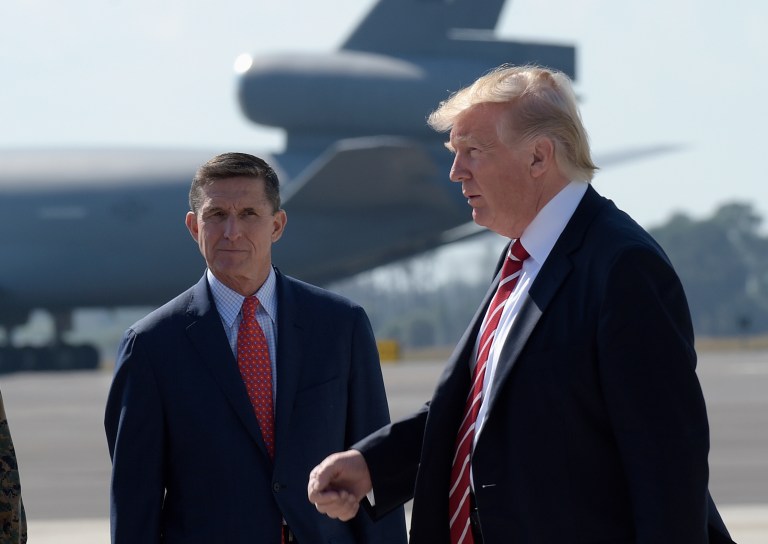 Trump is "evaluating the situation" regarding National Security Adviser Michael Flynn role in the administration. (AP Photo/Susan Walsh)