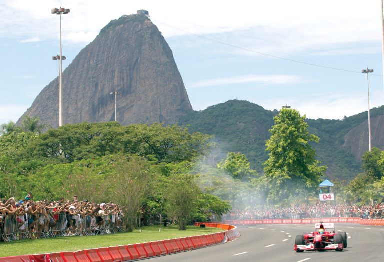 Silvia Izquierdo/AP
Formula1 driver Felipe Massadrives in front the Sugar Loaf mountain during the TNT Street Race in Rio de Janeiro, Brazil, on Sunday.