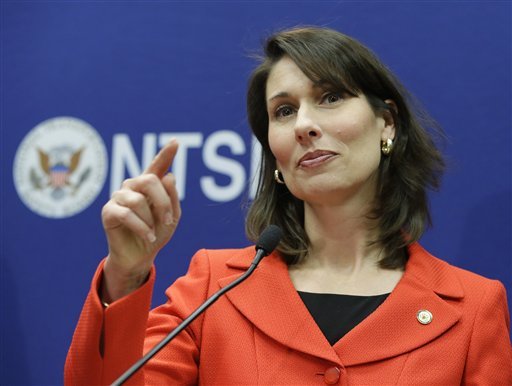 FILE - In this Jan. 24, 2013, file photo, National Transportation Safety Board Chairman Deborah Hersman points to a reporter during a news conference in Washington. The use of lithium ion batteries to power aircraft systems isn't necessarily unsafe despite a battery fire in one Boeing 787 Dreamliner and smoke in another, but manufacturers need to build in reliable safeguards, Hersman said Wednesday, Feb. 6, 2013. (AP Photo/Manuel Balce Ceneta, File)