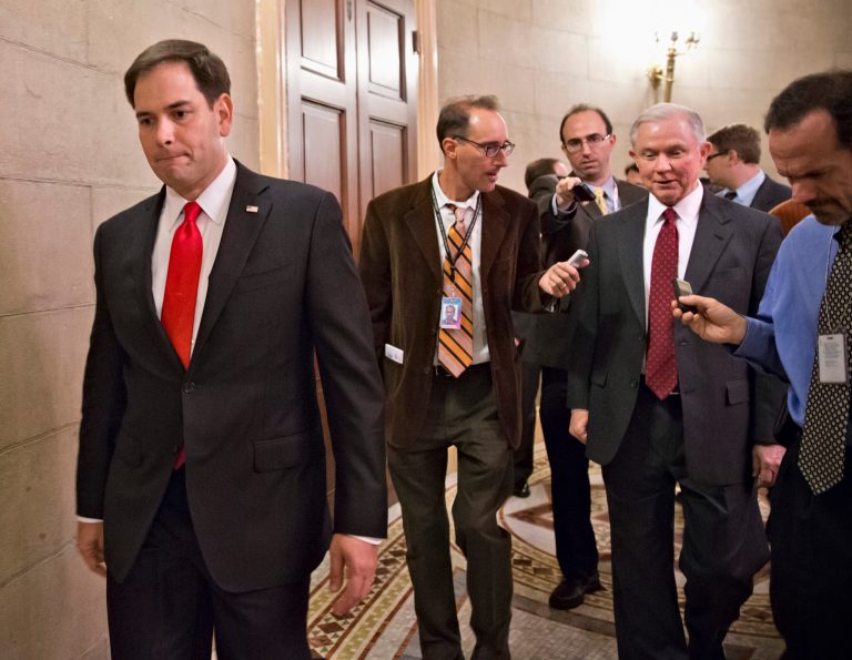 Sen. Marco Rubio, R-Fla., and Sen. Jeff Sessions, R-Ala., right, talk with reporters on Capitol Hill on Friday as Republicans returned to the Capitol after a two-hour meeting at the White House with President Obama, trying to come up with a bipartisan solution to the budget stalemate. (AP Photo/J. Scott Applewhite)