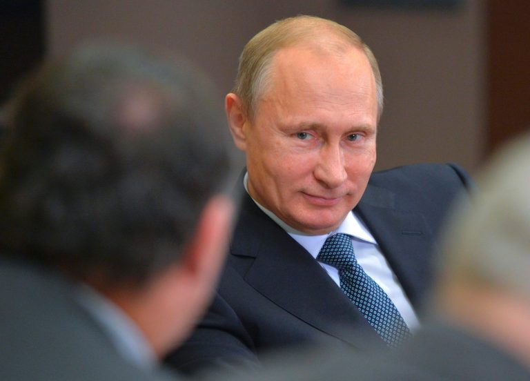 Russian President Vladimir Putin meets with CEO of Total Patrick Pouyanne in the Bocharov Ruchei residence in Sochi, Russia, Friday, Nov. 28, 2014. (AP Photo/RIA-Novosti, Alexei Druzhinin, Presidential Press Service)