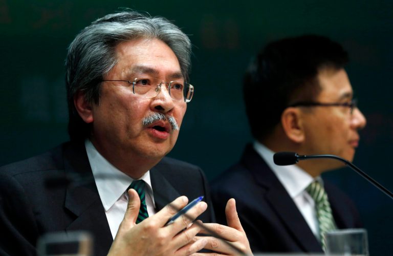 Hong Kong's Financial Secretary John Tsang speaks to the media during a news conference after delivering his budget speech in Hong Kong Wednesday, Feb. 26, 2014. Hong Kong's finance chief forecasts that the economy of the Asian financial center could grow up to 4 percent this year after expanding 2.9 percent in 2013. (AP Photo/Kin Cheung)