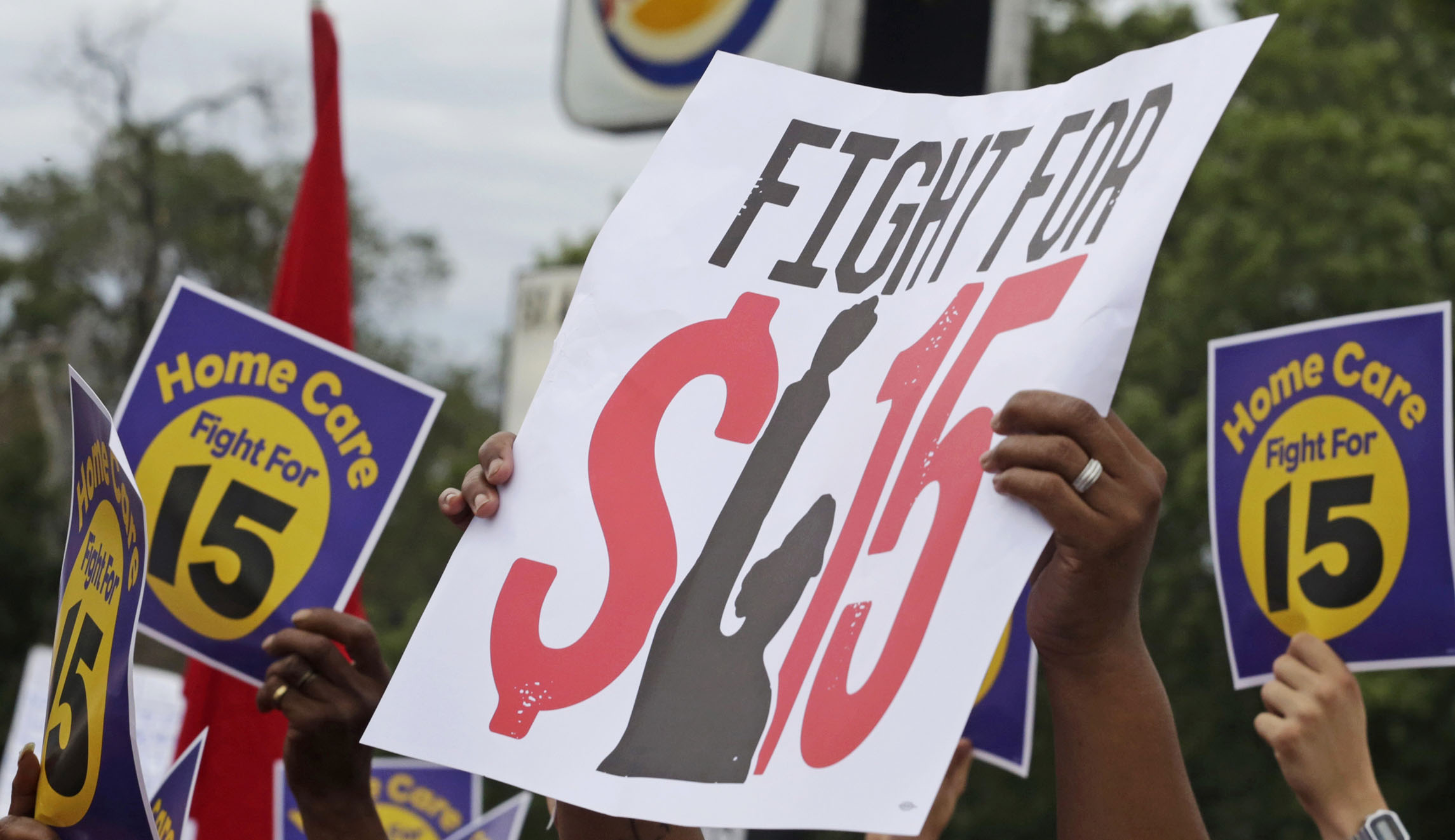 Minimum wage advocates scale back their $15 fight