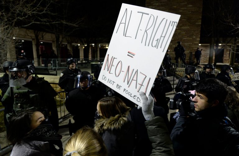 Reddit says communities were banned due to doxxing. ( Jeremy Papasso/Daily Camera via AP)