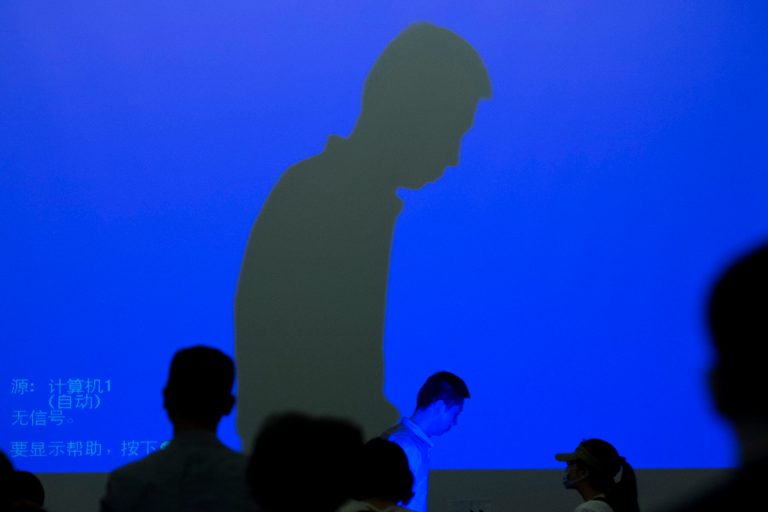 Relatives of Chinese passengers onboard the missing Malaysia Airlines Flight 370 leave a conference room after a meeting with Malaysian officials at a hotel in Beijing, China, Wednesday, April 30, 2014. The Australian agency heading up the search for the missing Malaysian jet has dismissed a claim by a resource survey company that it found possible plane wreckage in the northern Bay of Bengal.  (AP Photo/Alexander F. Yuan)