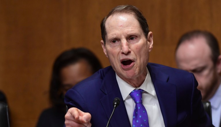 Senate Finance Committee Ranking Member Ron Wyden, D-Ore., said Friday that the tax windfall companies received after the GOP tax plan passed hasn't materialized in workers' paychecks as promised. (AP Photo/Susan Walsh)
