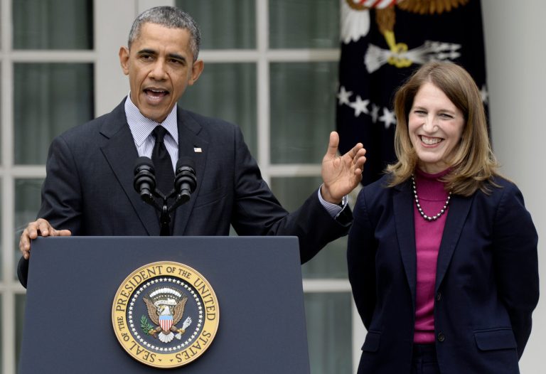 President Barack Obama, stands with his nominee to become Health and Human Services secretary, Budget Director Sylvia Mathews Burwell, while speaking in the Rose Garden of the White House in Washington, Friday, April 11, 2014, where he made the announcement. Burwell would replace Kathleen Sebelius who announced her resignation Thursday. (AP Photo/Susan Walsh)