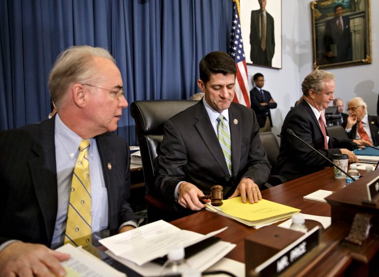 House Budget Committee Chairman Rep. Paul Ryan, R-Wis., center, flanked by committee member Rep. Tom Price, R-Ga., left, and the committee's ranking member Rep. Chris Van Hollen, D-Md., begins the markup of budget plan that would slash $5.1 trillion in federal spending over coming decade and promises to balance the government's books with wide-ranging cuts in programs like food stamps and government-paid health care for the poor and working class, Wednesday, April 2, 2014, on Capitol Hill in Washington. (AP/J. Scott Applewhite)