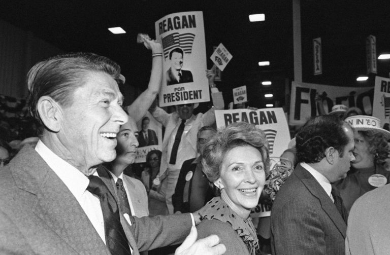 Republican presidential candidate Ronald Reagan and his wife Nancy Reagan are cheered as they enter onto the floor of the Florida Republican Presidential Preference Convention in Kissimmee Saturday, Nov. 17, 1979. (AP Photo)