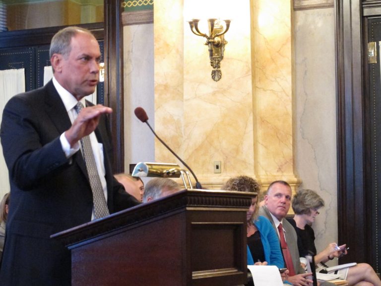 John Hanner, president of Aramark Correctional Services, defends before a prisons oversight committee his company's record in Ohio to the committee, saying food delays and substitutions have happened less than 1 percent of the time, Wednesday, July 30, 2014, in Columbus, Ohio. The state announced a $130,200 fine against Aramark, Wednesday for covered continued staffing shortages, unacceptable food substitutions and shortages and sanitation issues. (AP Photo/Andrew Welsh-Huggins)