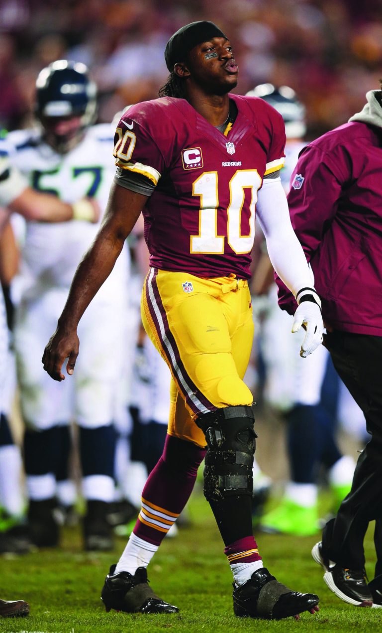 Win McNamee/Getty Images
Robert Griffin III will undergo surgery this week to repair a torn LCL, but it remains unclear whether he also tore his ACL on Sunday.