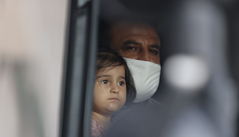 Afghan refugees arrive.