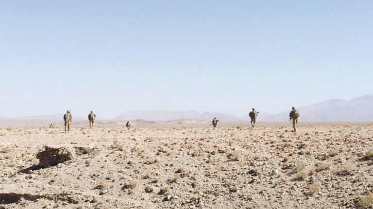 Afghanistan Raider Brigade soldiers conduct a foot patrol with a U.S. Stryker Brigade Combat Team in support of Operation Resolute Support and Operation Freedom's Sentinel on December 22, 2018.