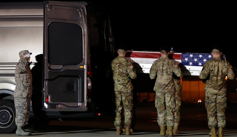 A U.S. Army carry team prepares to place a transfer case containing the remains of Capt. Andrew P. Ross into a vehicle, Friday, Nov. 30, 2018, at Dover Air Force Base, Del. According to the Department of Defense, Ross, 29, of Lexington, Va., was killed Nov. 27, 2018, by a roadside bomb in Andar, Ghazni Province, Afghanistan.