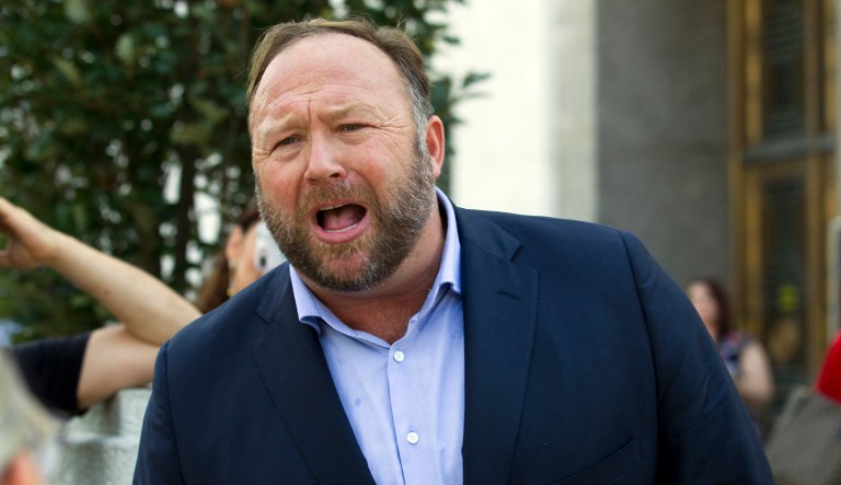 In this Sept. 5, 2018, file photo conspiracy theorist Alex Jones speaks outside of the Dirksen building of Capitol Hill in Washington.