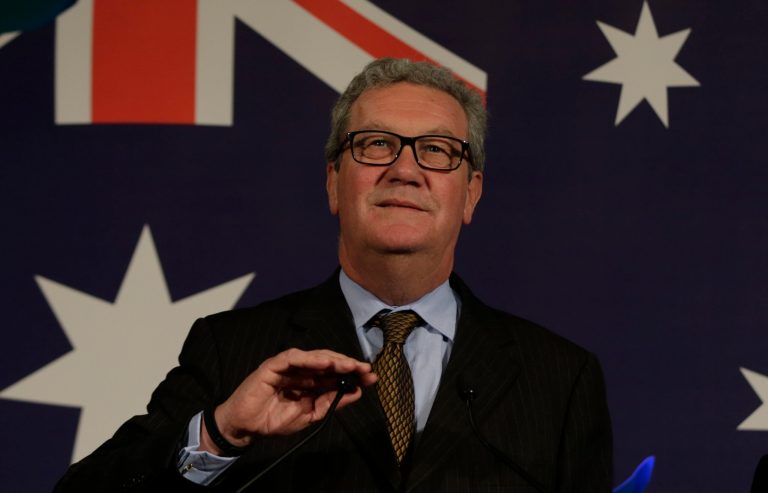 Australian High Commissioner Alexander Downer, left, speaks to guests next to the Australian cricket team captain Michael Clarke during a welcome party at the Australian High Commission in London, Monday, June 22, 2015. The Australian cricket team is in Britain to play a five test Ashes test series against England, with the first test to be played in Cardiff from July 8.