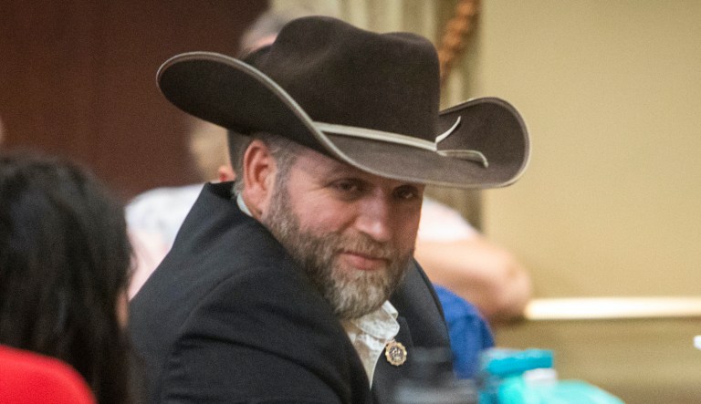 Ammon Bundy waits, moments before Idaho State Police came into the Lincoln Auditorium and asked everyone to leave, Tuesday, Aug. 25, 2020, in Boise, Idaho. Bundy, who refused to leave, was arrested, along with two others.