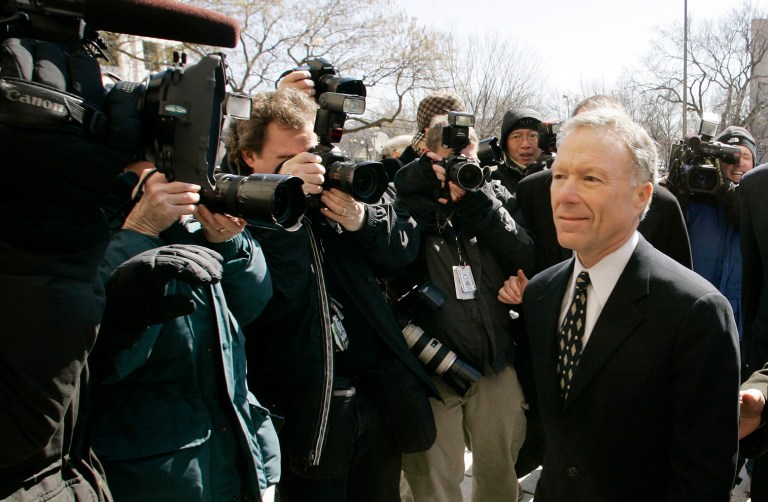 ** RETRANSMISSION FOR ALTERNATE CROP ** Former White House aide I. Lewis "Scooter" Libby walks past a line of photographers as he prepares to give a news conference outside federal court in Washington, Tuesday, March 6, 2007, after the jury reached its guilty verdict in Libby's perjury trial. 
