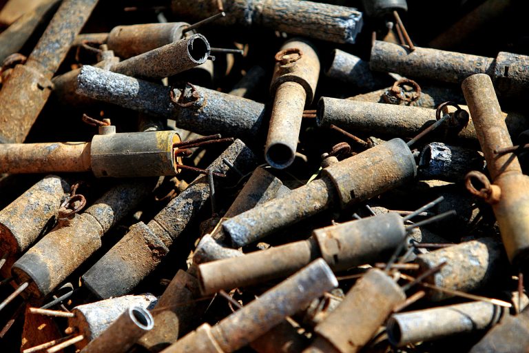 Parts of destroyed anti-personnel mines are seen in the U.N. buffer zone.