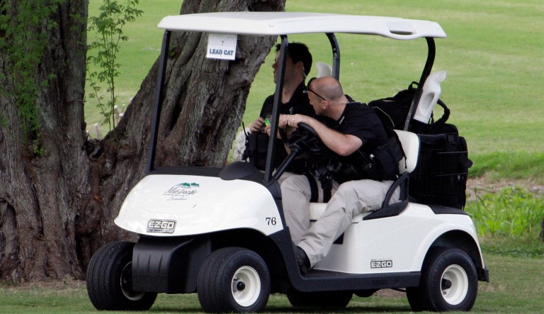 U.S. Secret Service Special agents use a golf cart during their duties.