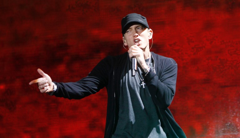  In this Sept. 13, 2010 photo, rapper Eminem performs at Yankee Stadium in New York. 