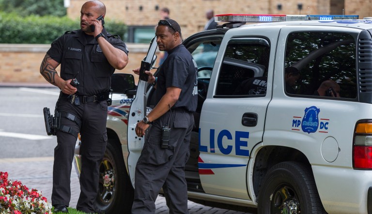 Washington Metropolitan police bomb squad members arrive at the Omni Shoreham hotel in Washington, Friday, June 19, 2015, after a bomb threat was called in during the Faith and Freedom Coalition event with GOP Presidential candidates.