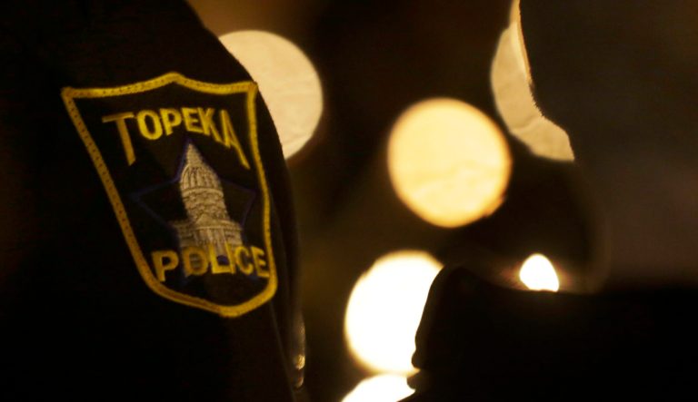 The arm patch of a Topeka police officer in Topeka, Kan., Monday, Dec. 17, 2012. 
