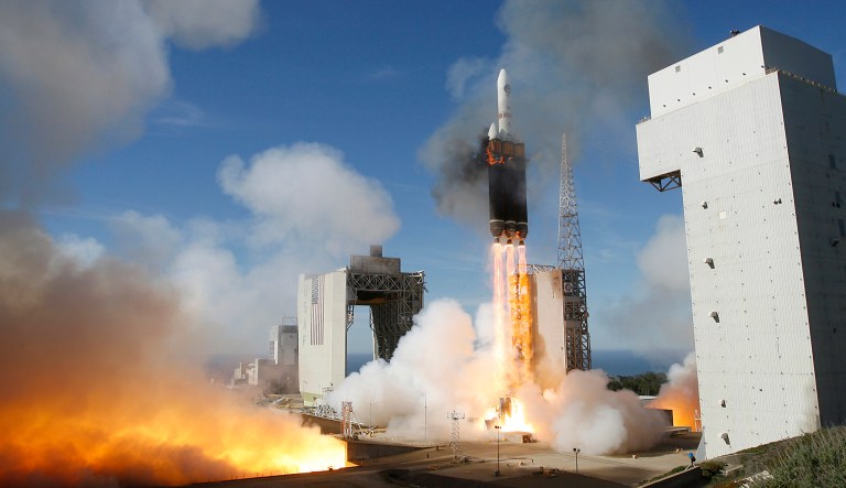 In this Jan. 20, 2011 file photo, a Boeing Delta 4 Heavy rocket rises from the launch pad during its first unmanned launch at Vandenberg Air Force Base, Calif. The 235-foot-tall Delta IV Heavy Launch Vehicle was carrying a payload for the National Reconnaissance Office. As it turns 50, the ultra-secretive National Reconnaissance Office is putting a multibillion-dollar misstep behind it and casting its spy satellites on new enemies, from al-Qaida bomb planters to North Korean nuclear engineers, according to its chief.