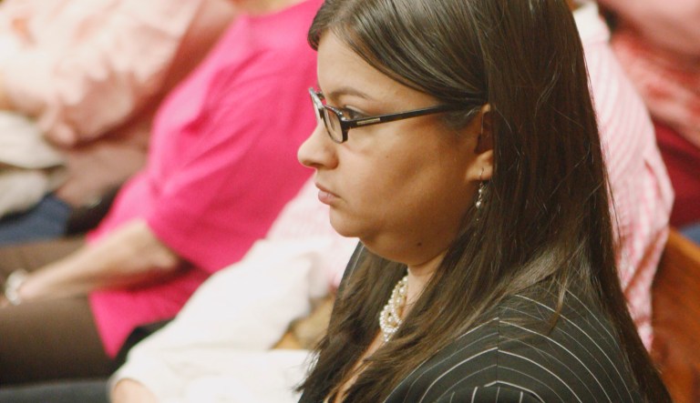 Stephanie Toti of New York, an attorney for the Center for Reproductive Rights, waits for a hearing to begin in a courtroom packed with more than a dozen abortion rights supporters clad in pink in Oklahoma  City Friday, Jan. 21, 2011.
