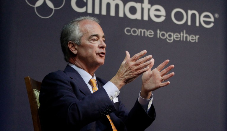 In this file photo taken April 5, 2011, Jim Rogers, Chairman and CEO of Duke Energy, gestures during a discussion about energy policy at the Commonwealth Club in San Francisco.