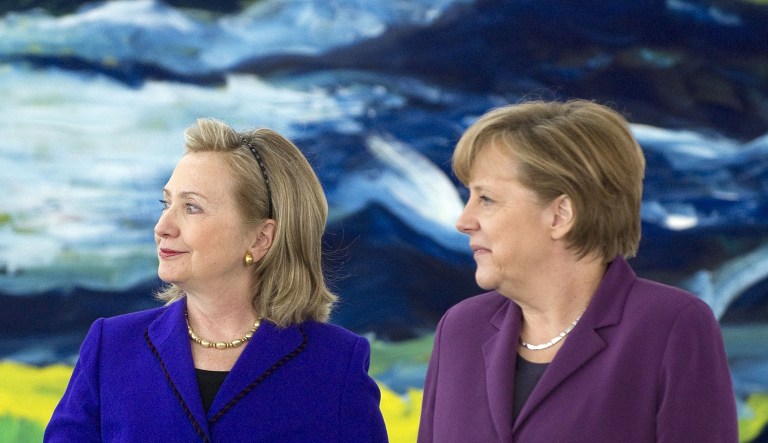 German Chancellor Angela Merkel and then-Secretary of State Hillary Clinton arrive for a press statement prior to a meeting at the Federal Chancellery in Berlin on April 14, 2011.