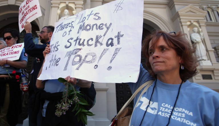Ellen Yoshitsugu, a high school science teacher from  San Francisco, joined more than 200 other teachers and supporters in a demonstration against proposed budget cuts to education in Sacramento, Calif., Monday, May 9, 2011.  Teachers from across the state began gathering Monday for a weeklong series of protests over the threat of deep budget cuts to public education and are calling on lawmakers to extend temporary increases to the sales, personal income and vehicle taxes that will expire June 30.