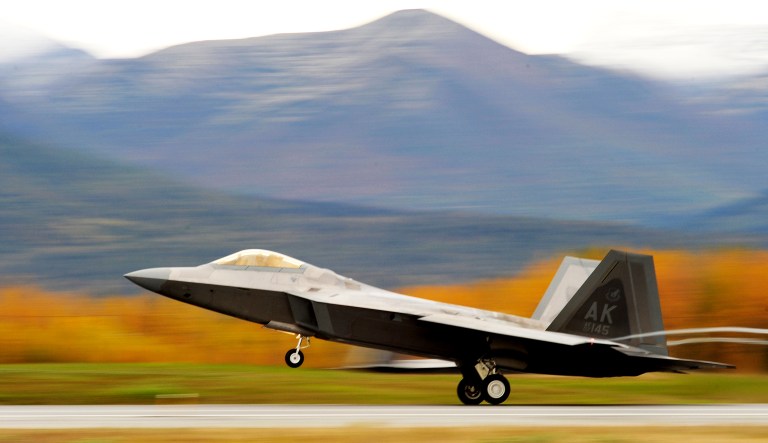 An Air Force F-22 Raptor stealth fighter takes off from Joint Base Elmendorf-Richardson in Anchorage, Alaska.