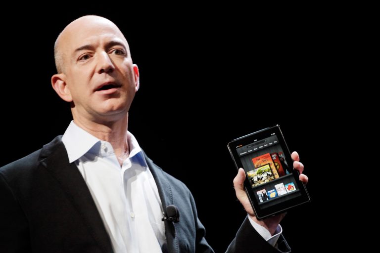 Jeff Bezos, Chairman and CEO of Amazon.com, introduces the Kindle Fire at a news conference, Wednesday, Sept. 28, 2011 in New York. The e-reader and tablet has a 7-inch (17.78 cm) multicolor touchscreen.