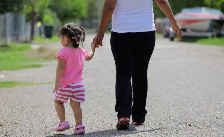 In this Sept. 16, 2015, photo, a woman in Sullivan City, Texas, who said she entered the country illegally, walks with her daughter who was born in the United States, but was denied a birth certificate. Texas has for seven years said it wonÂt accept Mexican identification cards when issuing birth certificates for children of people in the United States illegally. But it doesnÂt appear to have stepped up enforcement until recently, amid mounting political pressure to get tougher on immigration, documents obtained by The Associated Press show.