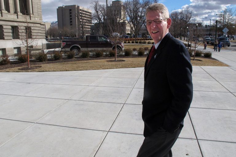 In this photo taken Monday, Jan. 30, 2012, Rep. Bob Nonini, R-Coeur d'Alene, walks toward the Idaho Capitol in Boise on Monday, Jan. 30, 2012. After another Republican representative quit smoking last year, Nonini is the lone open smoker in the Idaho Legislature, a dramatic change from a quarter century ago when lawmakers smoked in caucus meetings and even during hearings on the floor of the House.