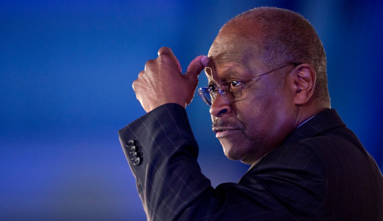 Herman Cain gestures as he speaks during the Faith and Freedom Coalition Road to Majority 2013 conference, Saturday, June 15, 2013, in Washington.