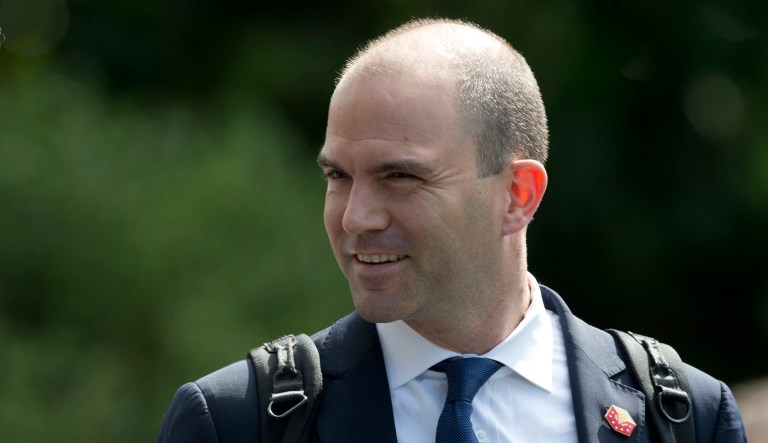 Former deputy national security adviser Ben Rhodes to President Barack Obama walks across the South Lawn of the White House. 