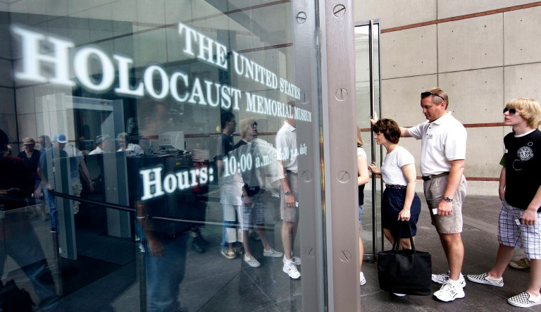 People stand in line to enter the U.S. Holocaust Memorial Museum in Washington.