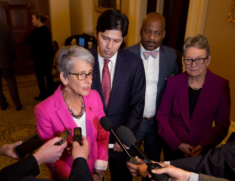 State Sen. Hannah-Beth Jackson, D-Santa Barbara, left, talks to reporters accompanied by Senate President Pro Tem Kevin de Leon, D-Lois Angeles, second from left; Sen. Isadore Hall III, D-Compton, third from and left and Sen. Loni Hancock, D-Berkeley, at the Capitol, in Sacramento, Calif., on Thursday, June 30, 2016. Jackson is chairwoman of the powerful judiciary committee as well as the California Legislative Women's Caucus. Jacksonâs legislative accomplishments include what was considered the strongest equal pay legislation in the country.